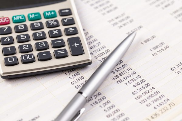 Items for business on a light background on the table, view from the top